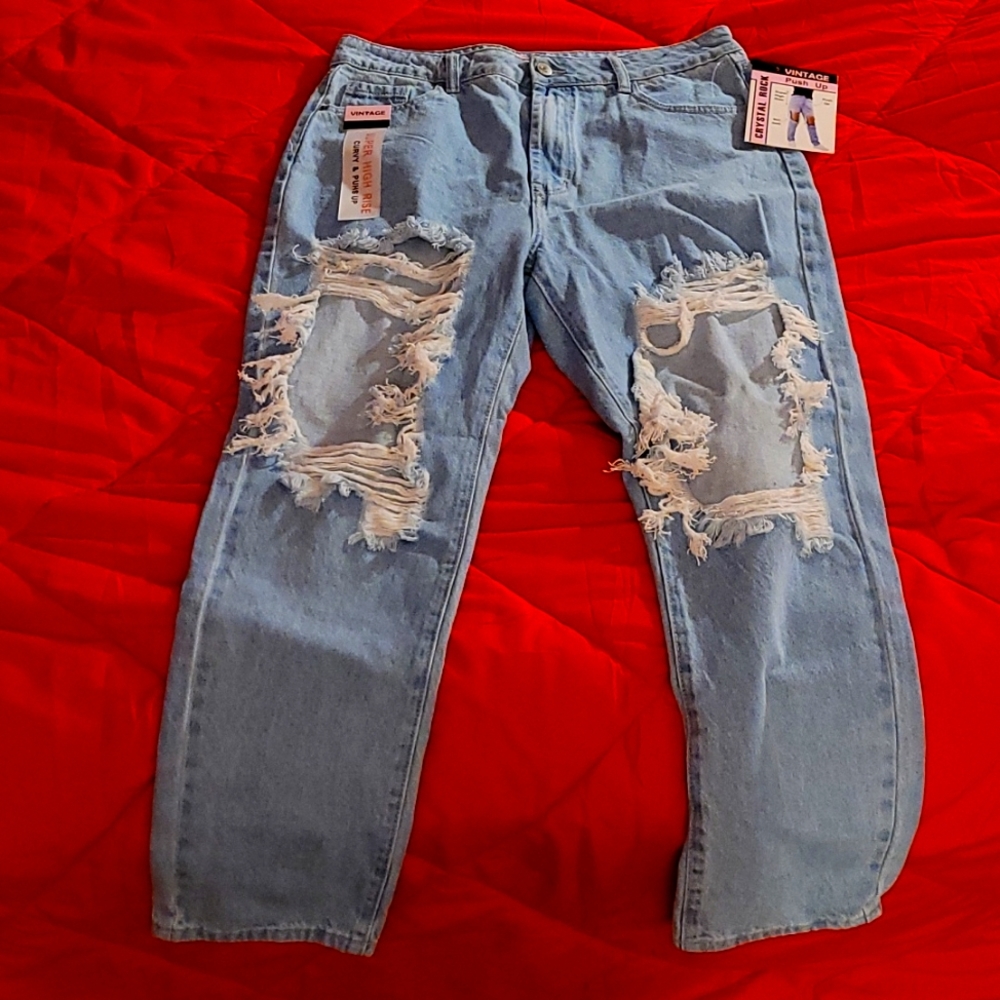 New vintage style distressed high rise jeans